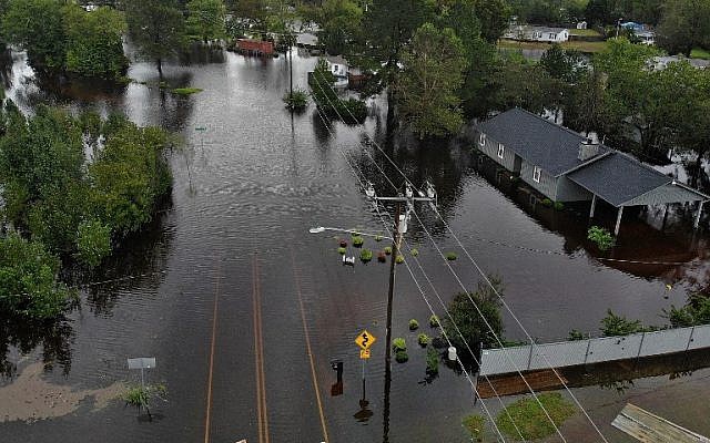 Floodwaters rise as killer storm stalks southeastern US