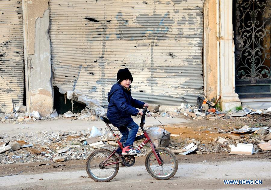 1,500 families return to war-ravaged city near Damascus