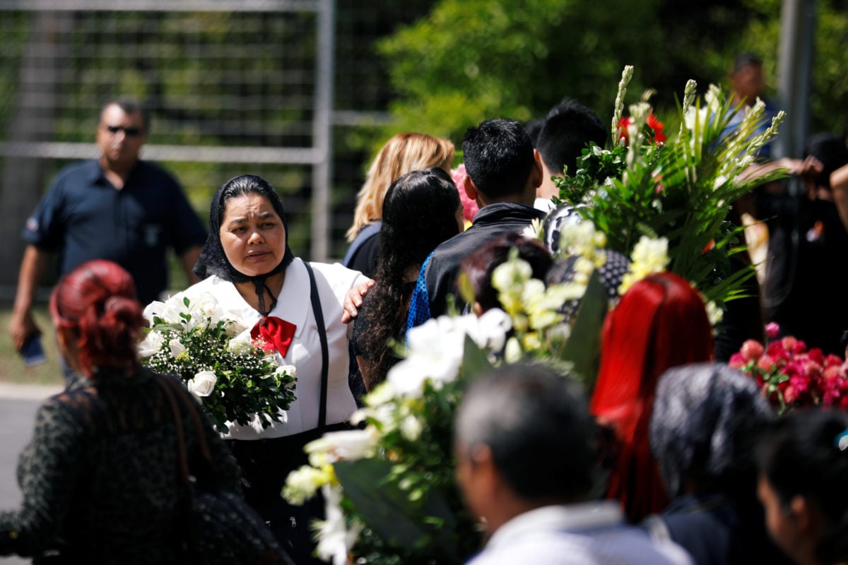 Drowned Salvadoran migrant father, daughter buried, clashes on U.S. immigration policy still alive