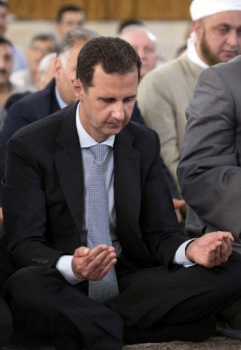 Syria's Assad in rare appearance outside capital