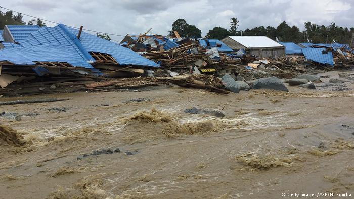 Death toll from Indonesia's flash floods, landslides rises to 77