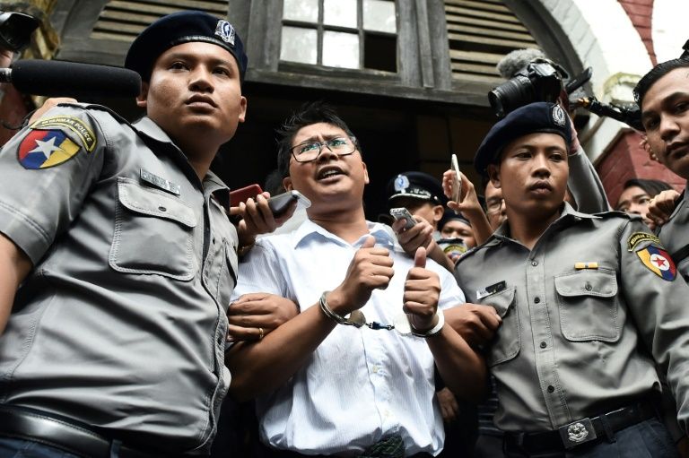 Dozens rally for jailed Reuters reporters in Myanmar