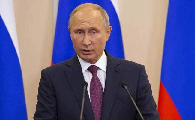 Putin condemns foreign troops in Syria in Assad meeting