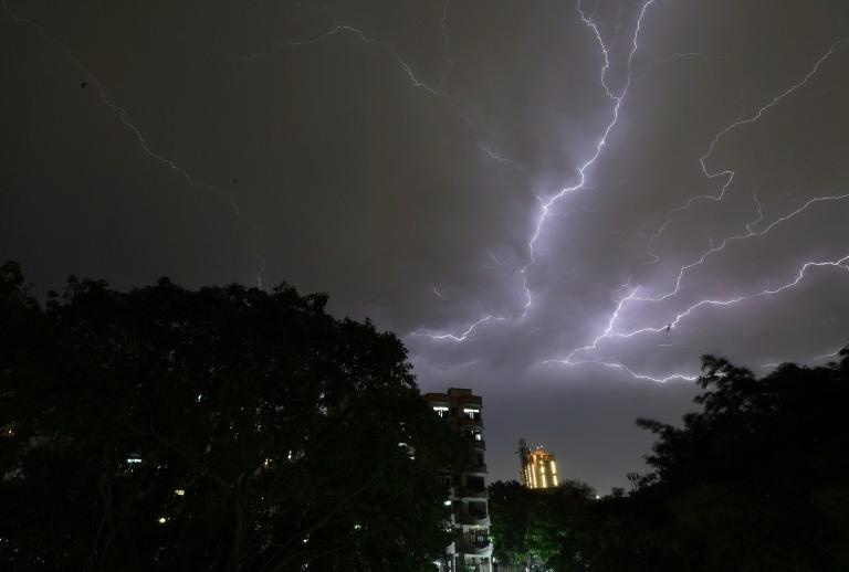 At least 116 killed as storms batter India