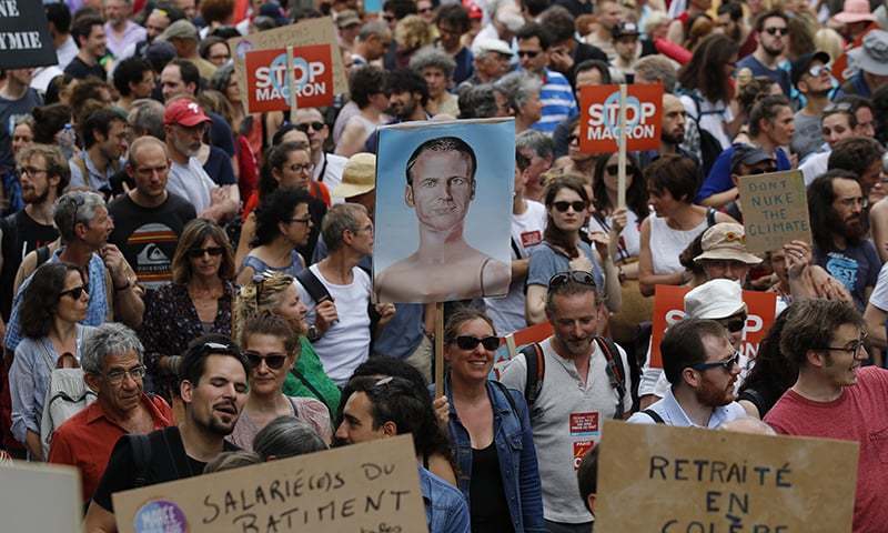 Thousands march in France against Macron reforms