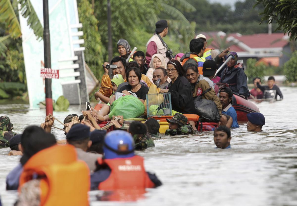 Indonesia floods, landslides death toll climbs to 59