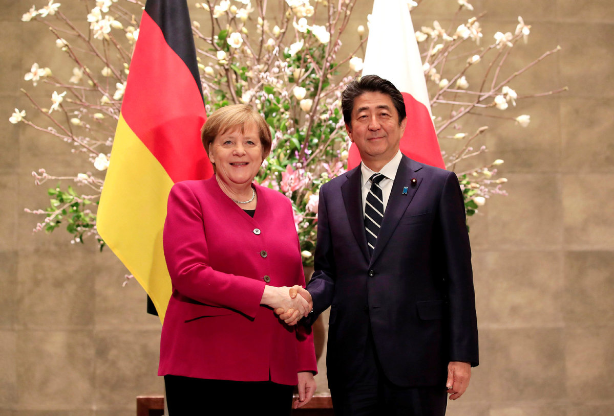 Abe, Merkel hold talks, calling for free trade