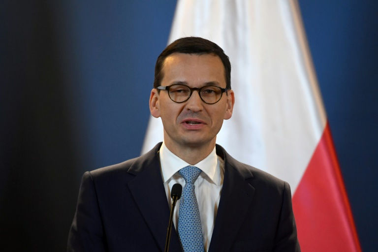 Polish PM sacks defence, foreign ministers in reshuffle