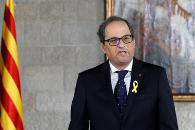 New Catalan leader shuns constitution as sworn in