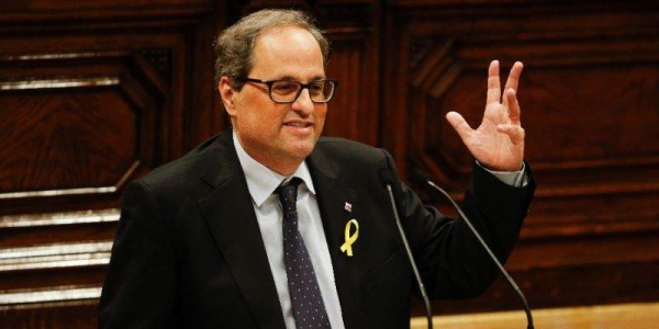 Catalan leader Quim Torra calls for talks with new Spain PM