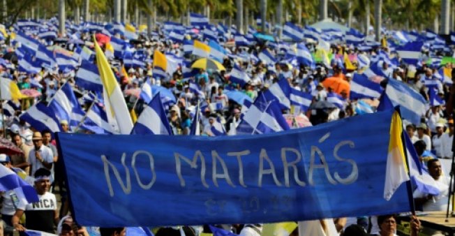 Thousands march to demand justice as Nicaragua protest toll hits 43