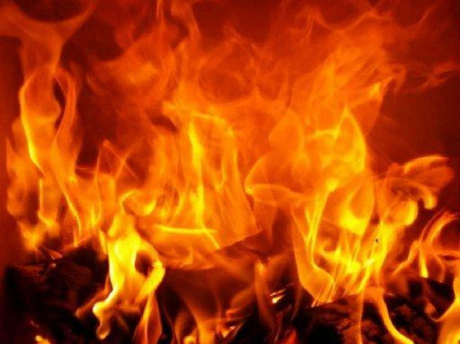 12 houses burned to ashes, one woman killed in fire