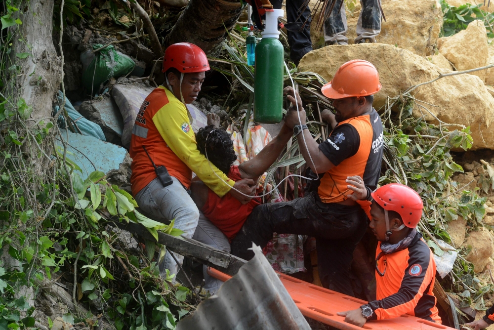 12 killed, dozens missing in new Philippine landslide