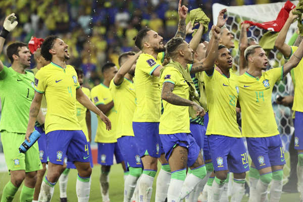 Brazil, Portugal reach World Cup last 16