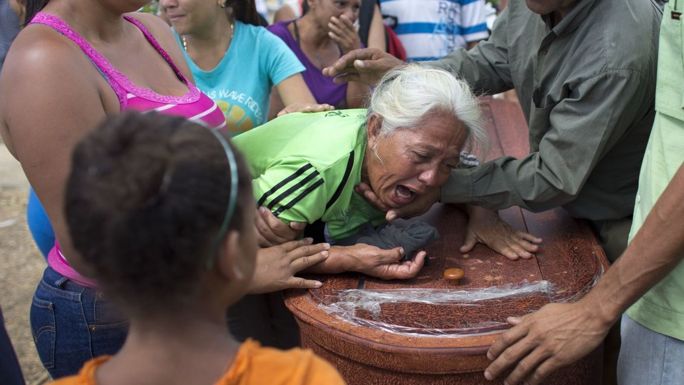 5 officials arrested in Venezuela after prison fire killed 68