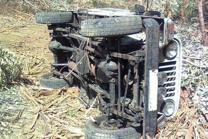 Jeep plunges into river