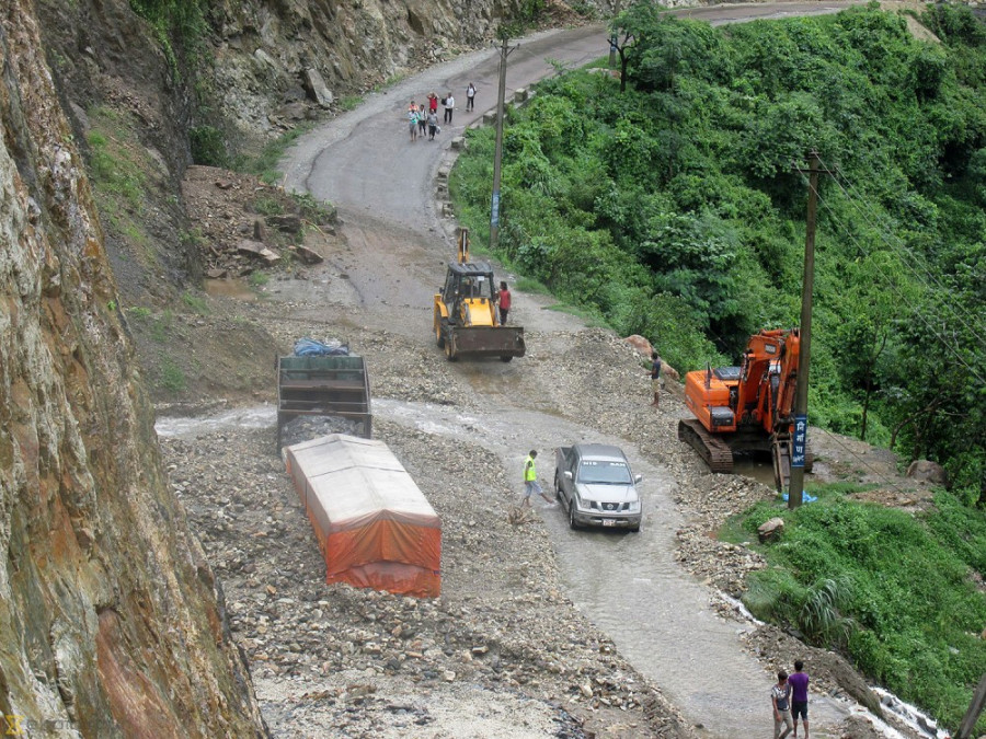 Landslide buries two vehicles