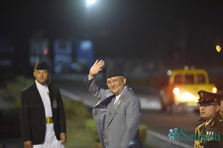 PM Oli back home from China