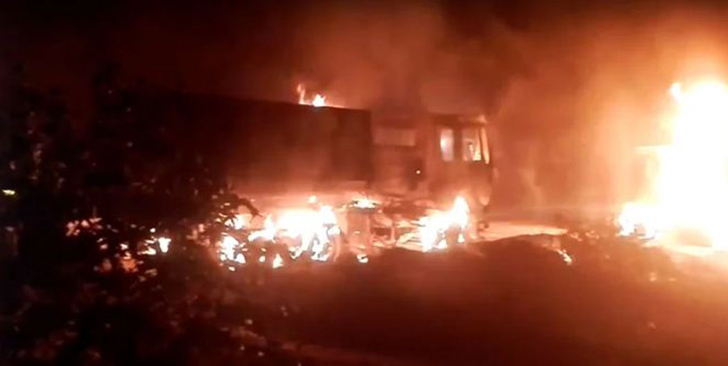 Two Indian container trucks set ablaze