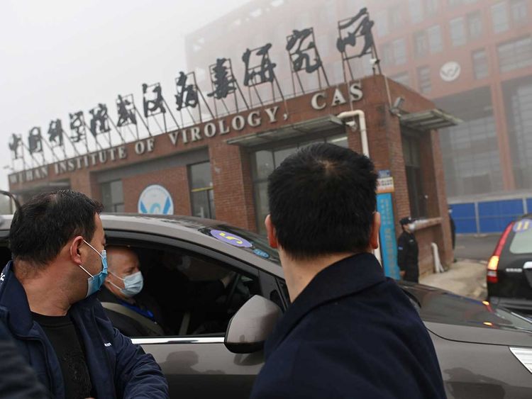 WHO team visits Wuhan lab as Russian vaccine boosts hopes