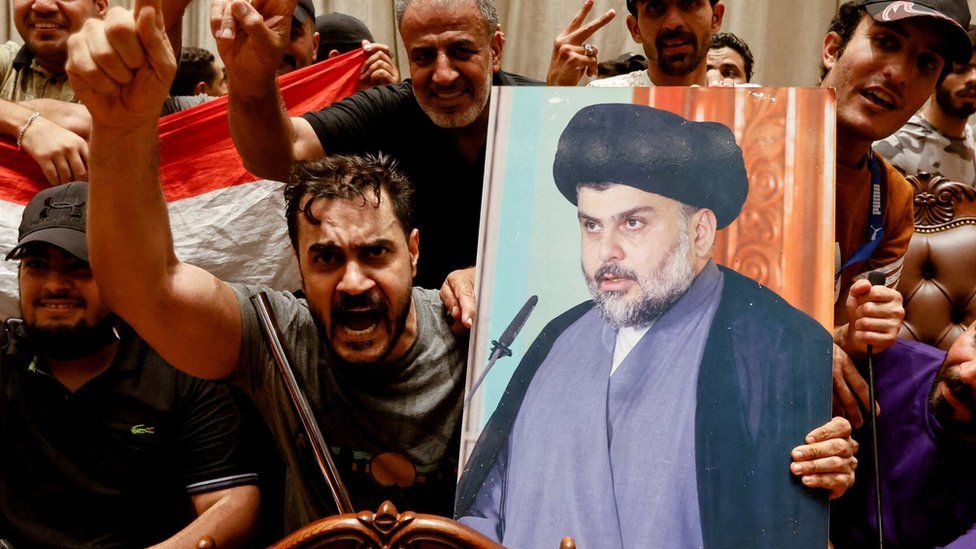 Buildings stormed after Moqtada al-Sadr, Iraqi political leader, retires