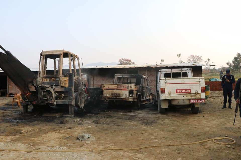 Unidentified group torches vehicles