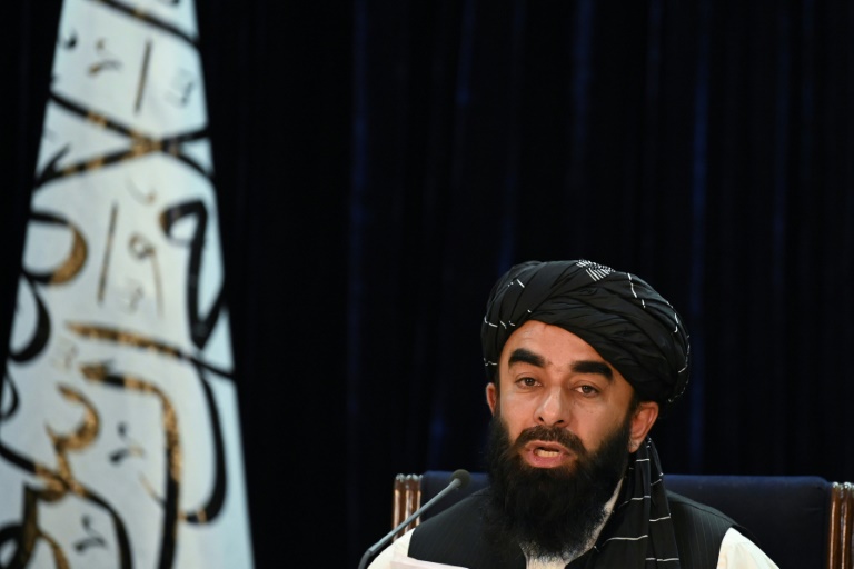 Taliban announce hardline government as protests grow