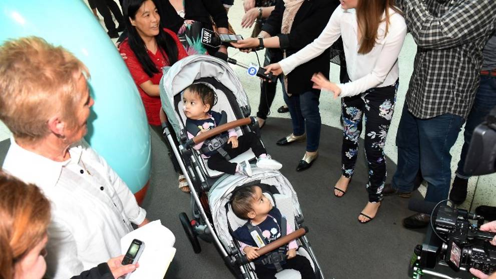 Separated Bhutanese twins leave Australia hospital