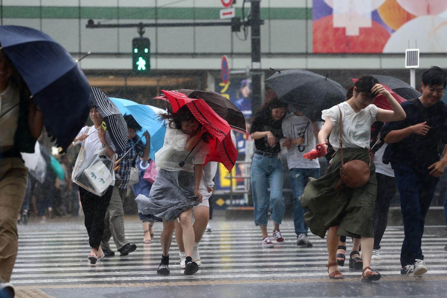 Strong typhoon barrels towards flood-hit western Japan