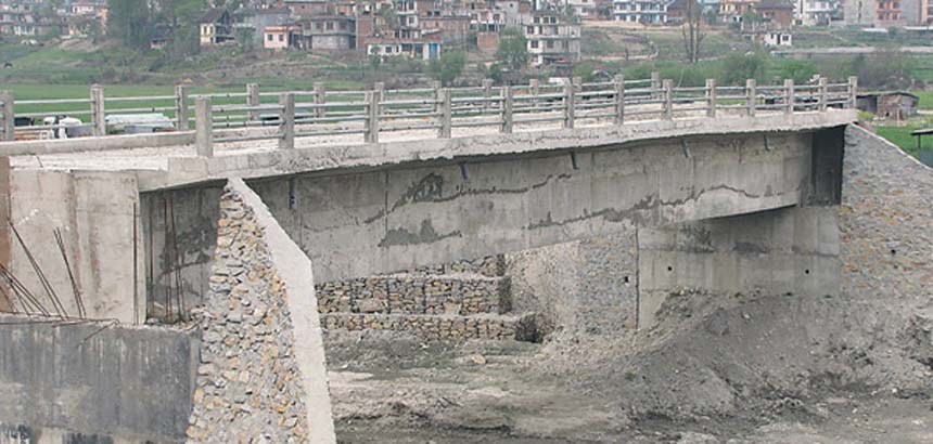 Thousands affected as bridge slab washed away