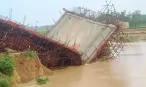 Flood takes away under construction bridge
