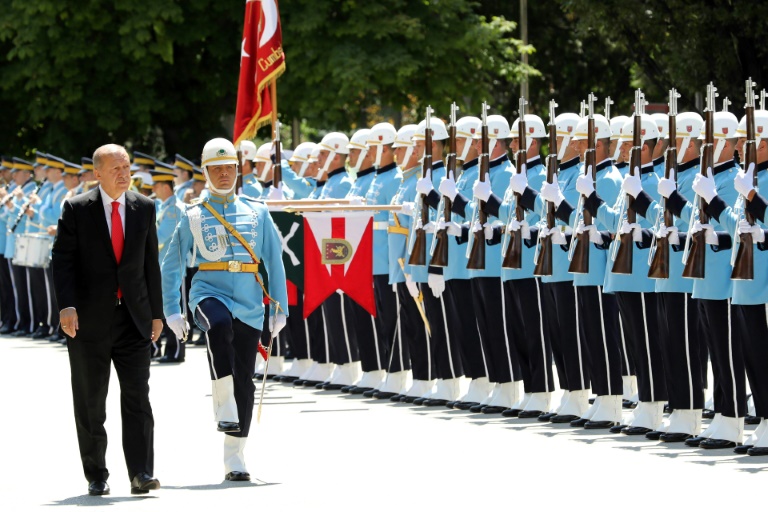 Turkey sacks 18,500 state employees in new decree