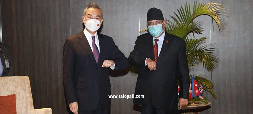 PHOTOS: Chinese FM Yi holds meeting with CPN (Maoist Center) Chair Dahal