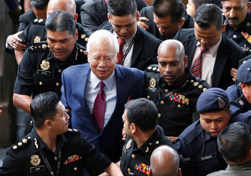 Former Malaysian PM Najib granted bail after being charged in court