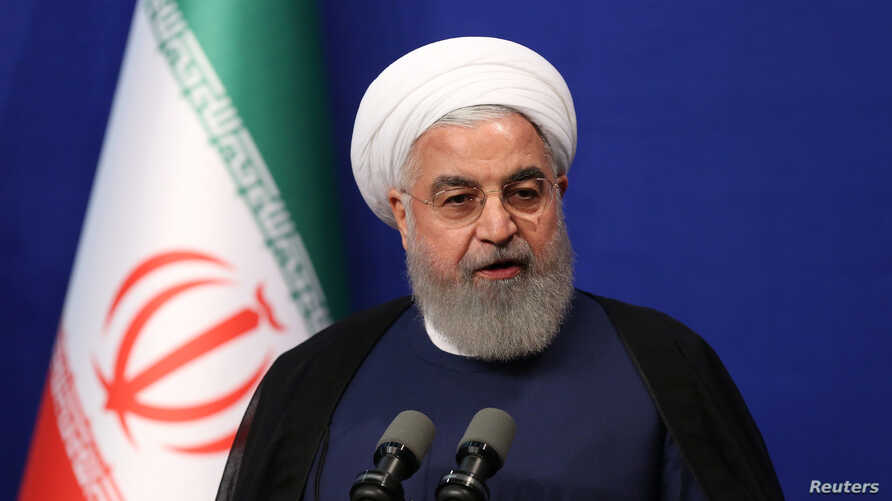 Iran's Rouhani hails departure of 'tyrant' Trump