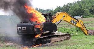 Mayor's two dozers set ablaze