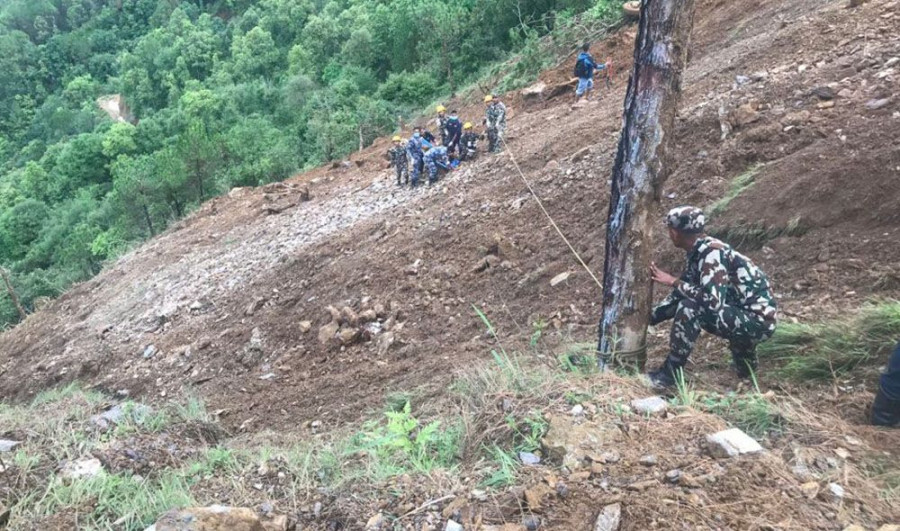 One killed, three others rescued after landslide buries house