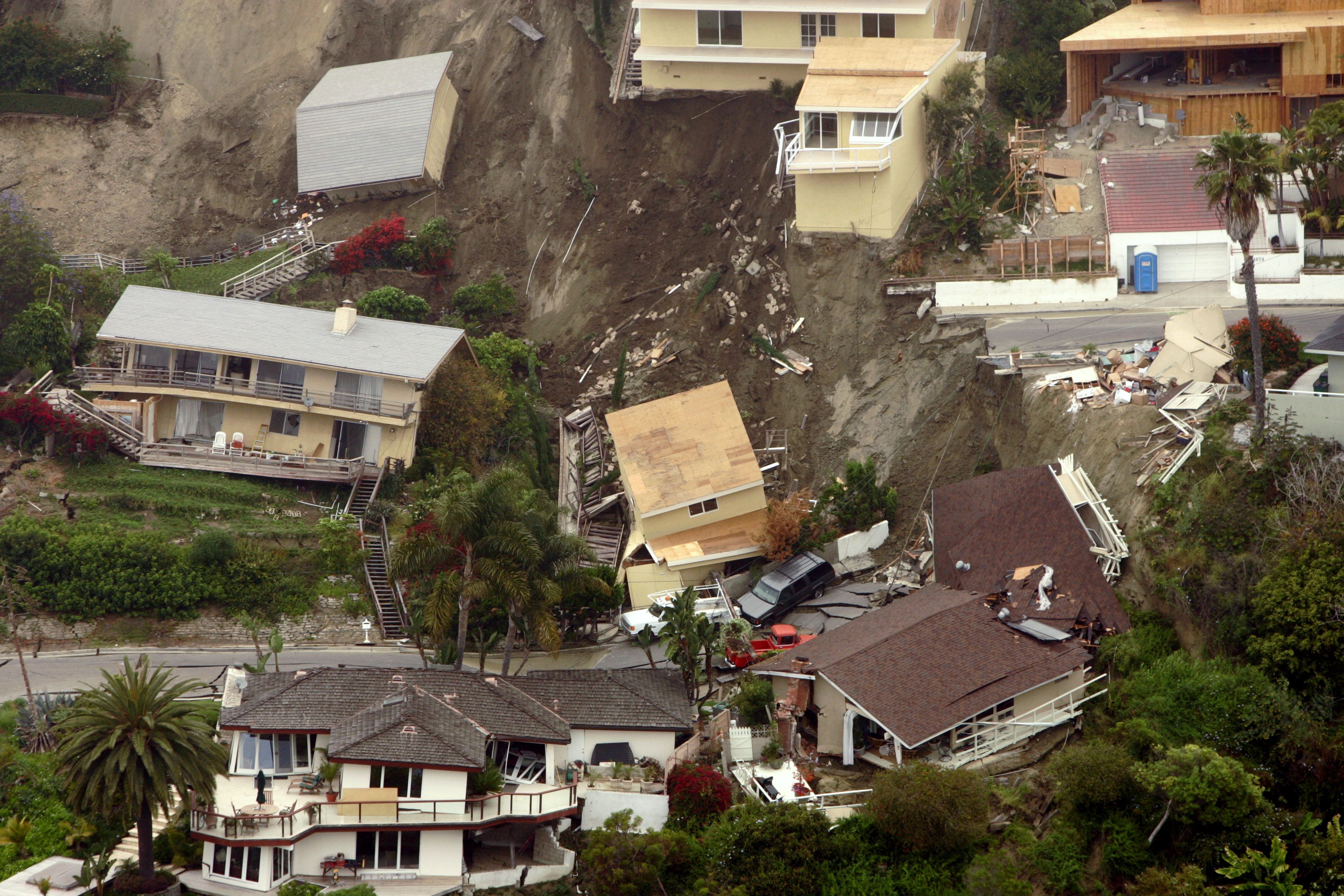 Landslides damages a house, 10 more at risk