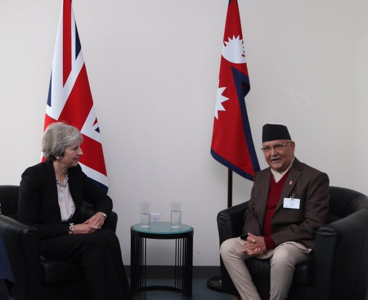 PM Oli, British PM May hold meeting