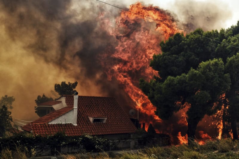 Greek PM vows to end illegal building 'chaos' after fire disaster