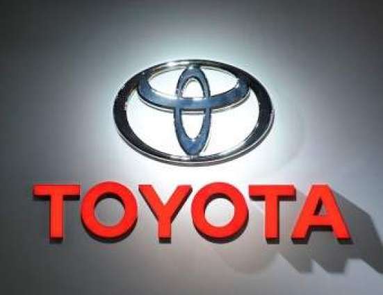 Toyota posts record profit but warns on outlook