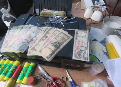 Three arrested with machine used for printing fake currency notes