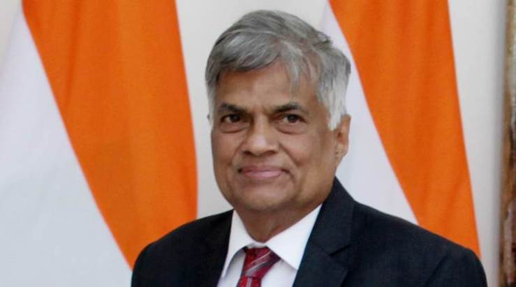 Sri Lanka reinstates ousted prime minister: official