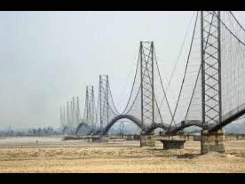 Decrepit suspension bridge over Mahakali River creates difficulties to locals