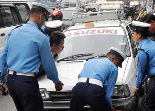 12,000 taxi drivers faced action