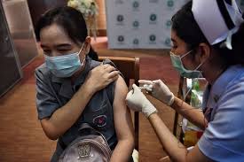 Thailand suspends vaccine rollout as Biden eyes Independence Day