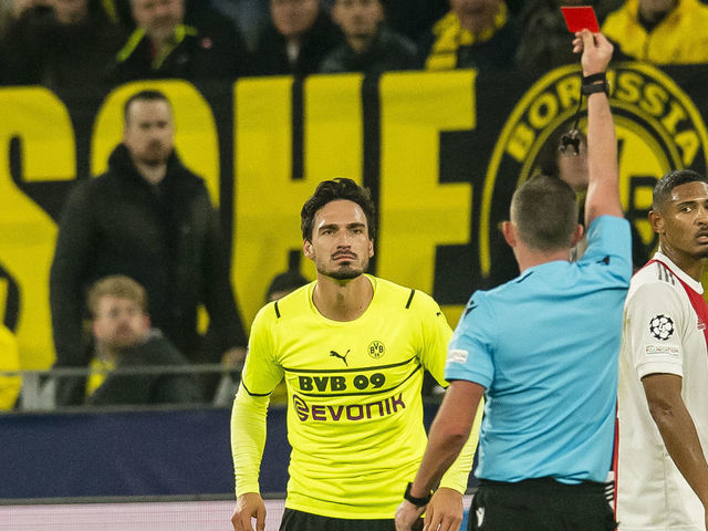 English referee Oliver upsets Dortmund with a disputed red card for Hummels