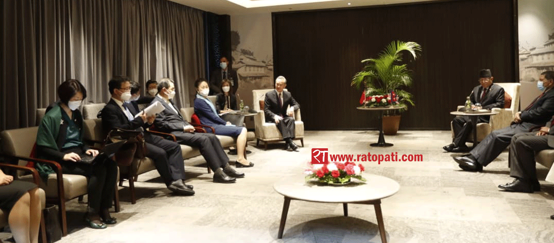 चिनियाँ विदेशमन्त्री यी र माओवादी अध्यक्ष प्रचण्डबीच भेटवार्ता, तस्बिरमा हेर्नुहोस्