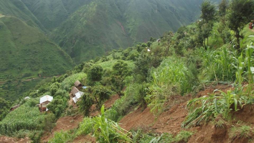 Boy killed after landslide buries house