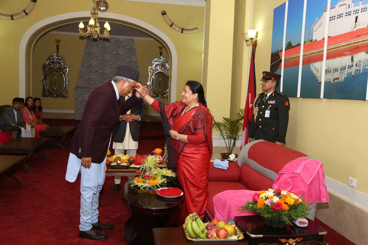 President offers tika to Vice President, PM and the general public